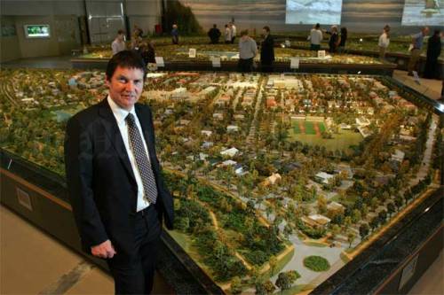 pegasus-bob-robertson-ce-of-infinity-investment-group-with-large-scale-model-of-pegasus-town-feb-2006-teara-govt-nz